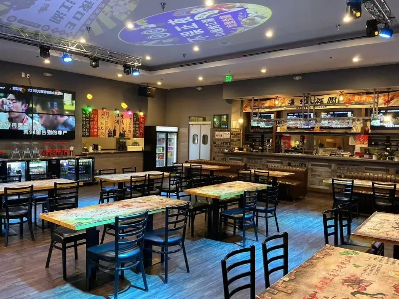 Modern dining space with bar and projection ceiling at NO WINE NO NIGHT, a Chinese Restaurant in Rowland Heights
